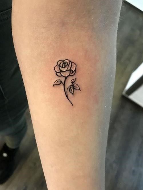 Rose tattoo on the leg