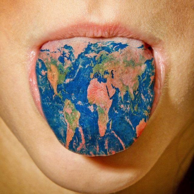 world map tattoo on tongue 2