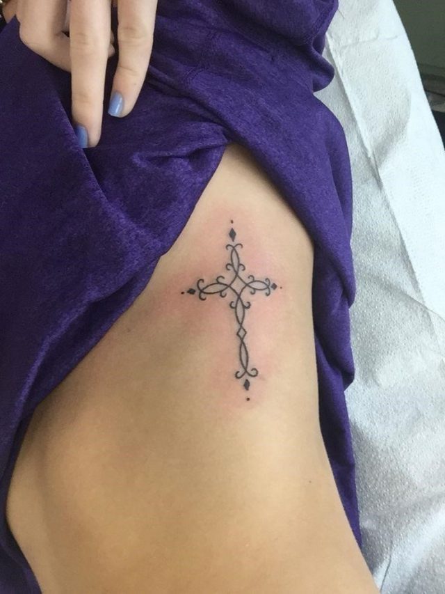 16 Ribs Cross Tattoo