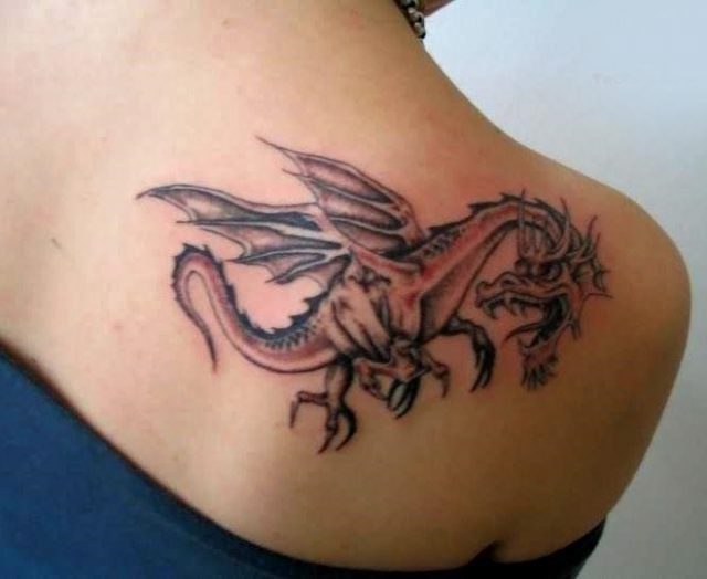 24 tribal dragon tattoo