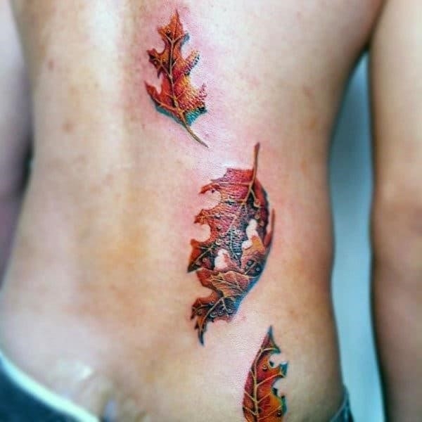 3d maple leaf mens rib cage tattoo ideas
