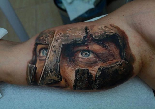 A Roman legionary stares intently in this photo realistic tattoo design