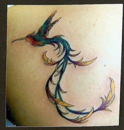 A hummingbird phoenix tattoo design that uses elegant curving lines to create the fantastic tail