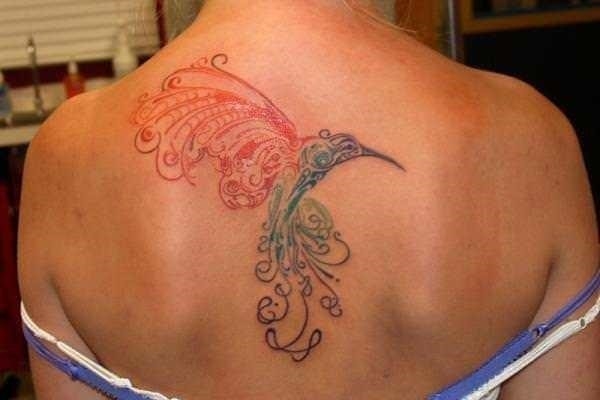 An abstract tattoo design of a hummingbird in flight