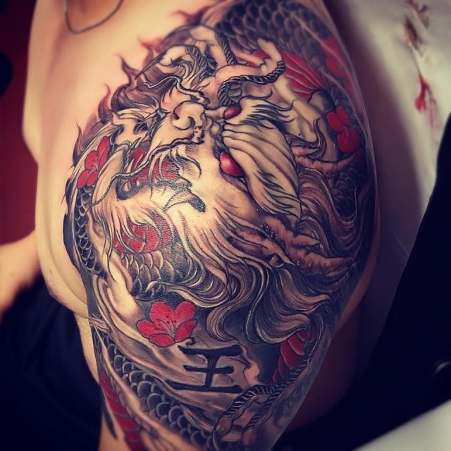 Asian Tattoo On Left Shoulder For Men