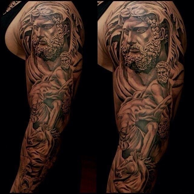 Attractive Christian Tattoo On Man Left Full Sleeve