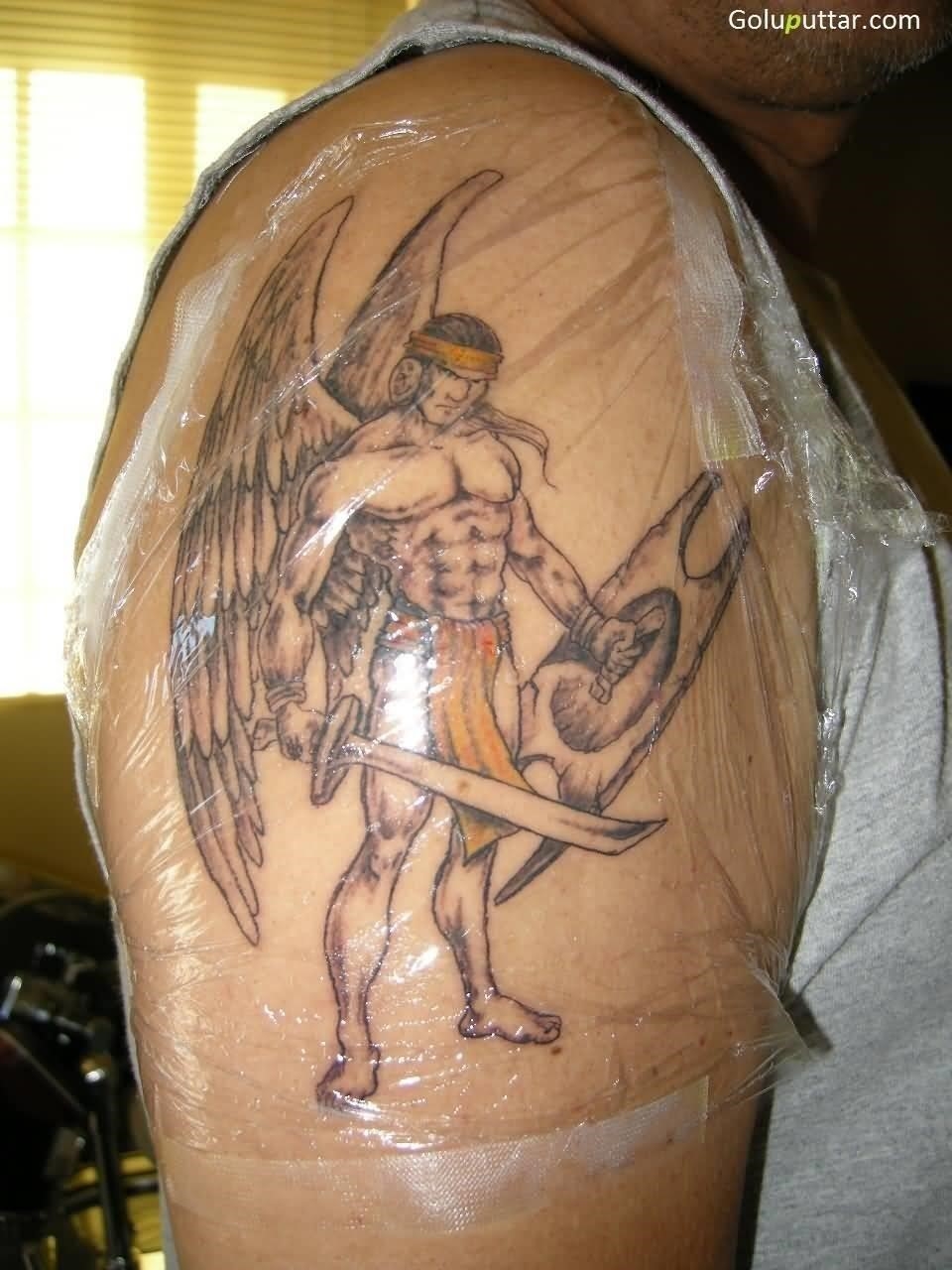 Fallen angel men with two swords tattoo idea | TattoosAI