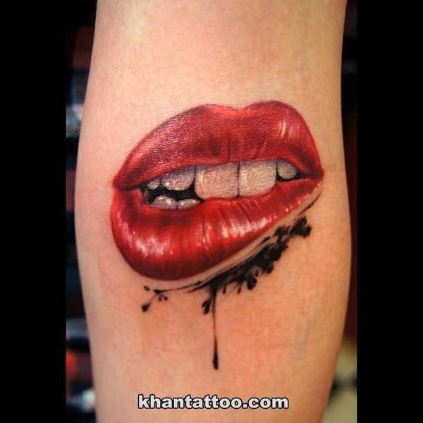 Bitting Lips With Teeth Tattoo On Arm By Khan grande