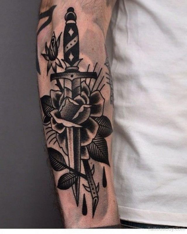 Black Rose And Dagger Traditional Tattoo On Arm Sleeve