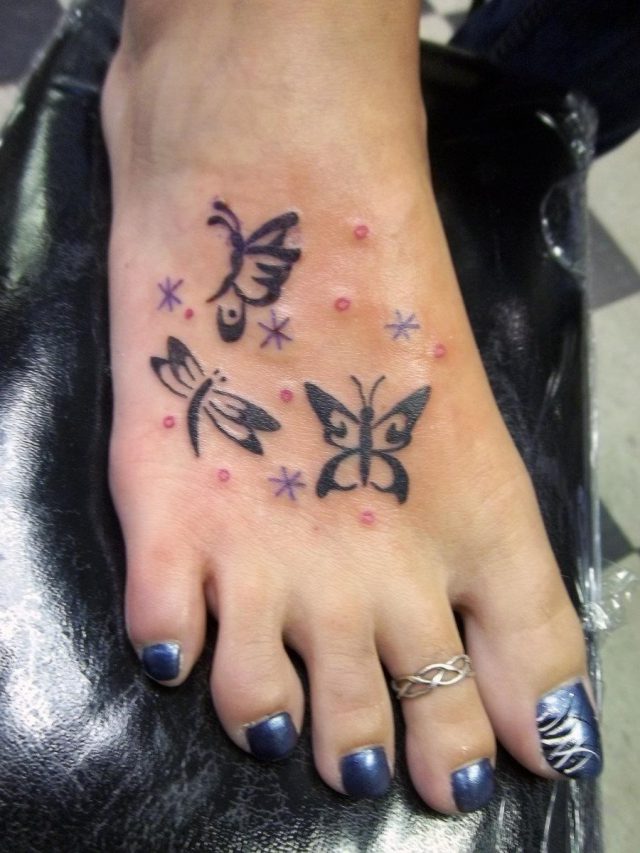 Black Tribal Butterfly Foot Tattoo