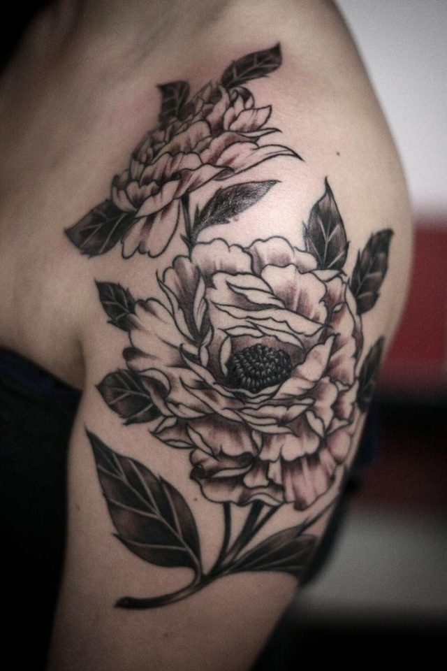 Black and white flower tattoo by Alice Carrier