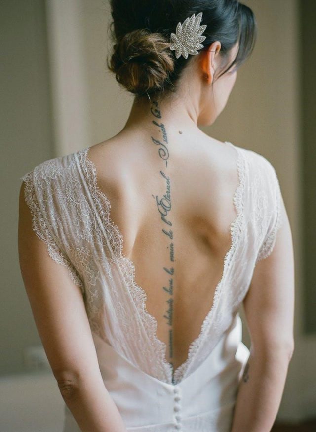 Bride with Spine Tattoo by Greg Finck Photography Script Tattoo Along the Spine Vintage Wedding Elegant Tattoo Ideas