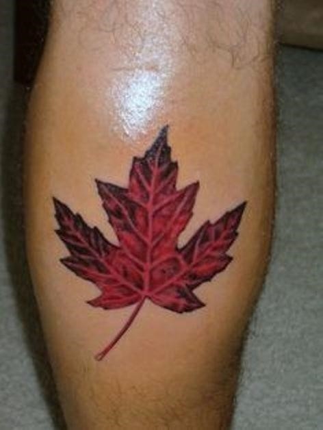 Candian Leaf Tattoo On Leg