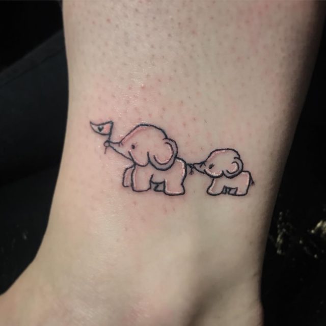 Cartoon Two Little Elephant Tattoo Design