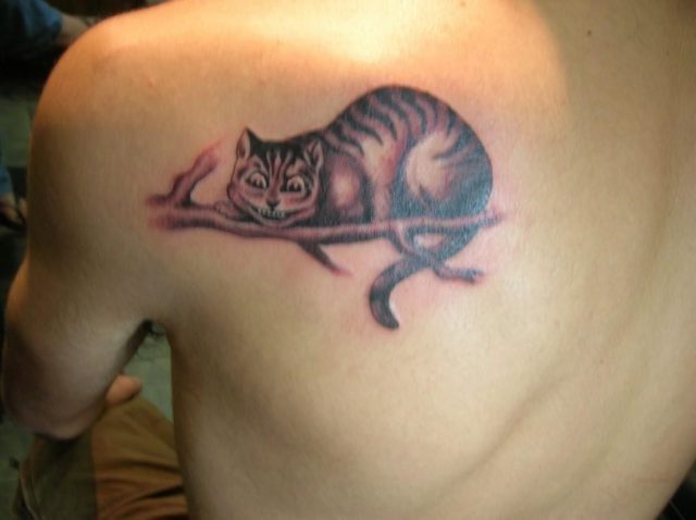 Cheshire Cat Tattoo On Left Back Shoulder