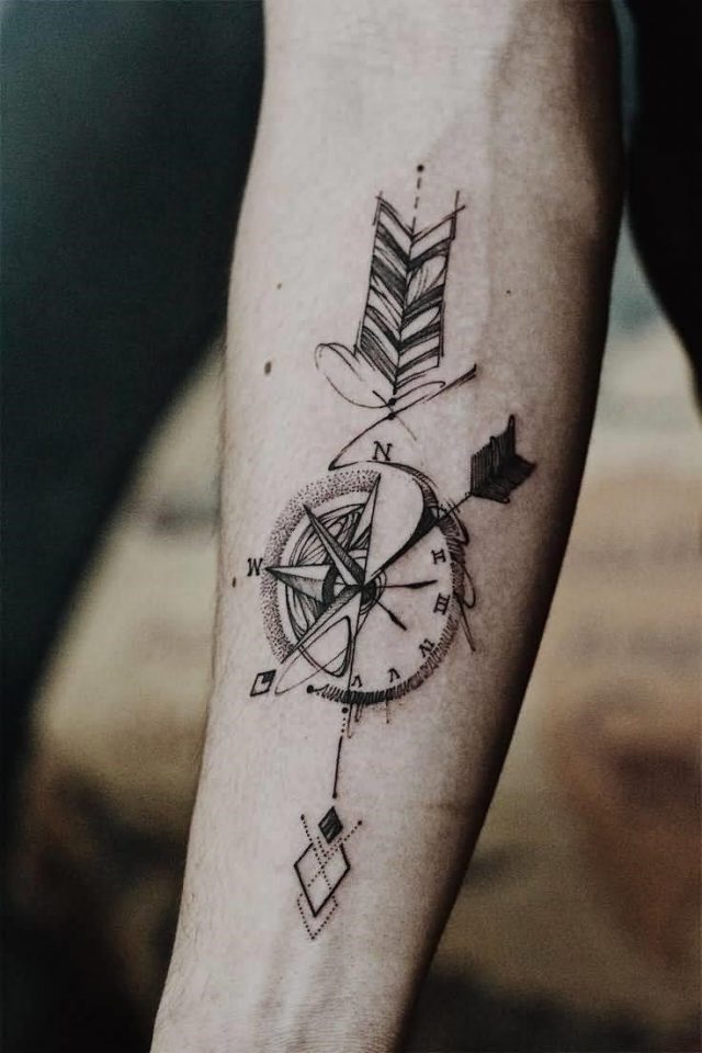 Compass Arrow Tattoo On Forearm