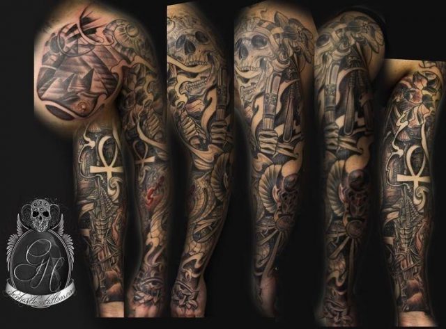 Dark Ink Egyptian Tattoo On Sleeve