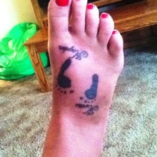 Delightful Baby Footprints Tattoo Design