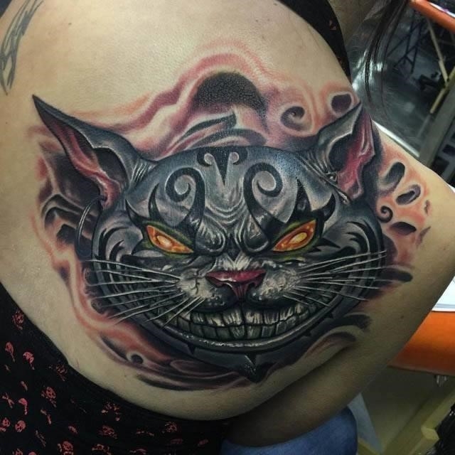 Evil Cheshire Cat Tattoo by Roman Abrego