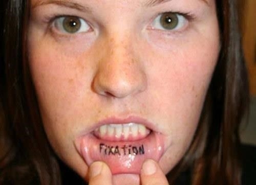 Fixation” Inner Lip Tattoo