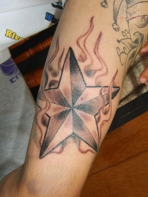 Flaming Nautical Star Elbow Tattoo