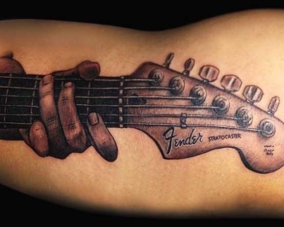 Guitar As Music Tattoo Designs