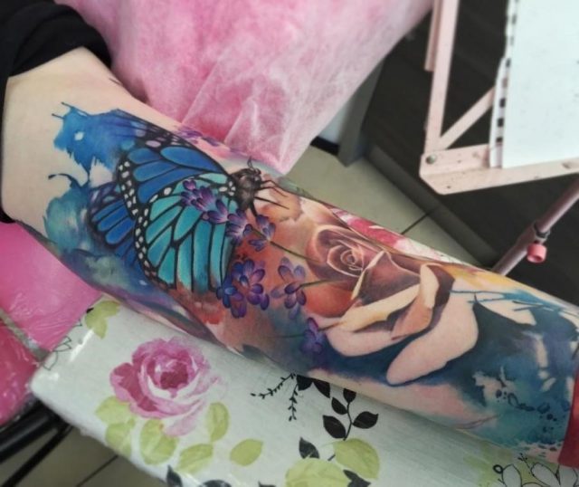 Half sleeve butterfly watercolor tattoo