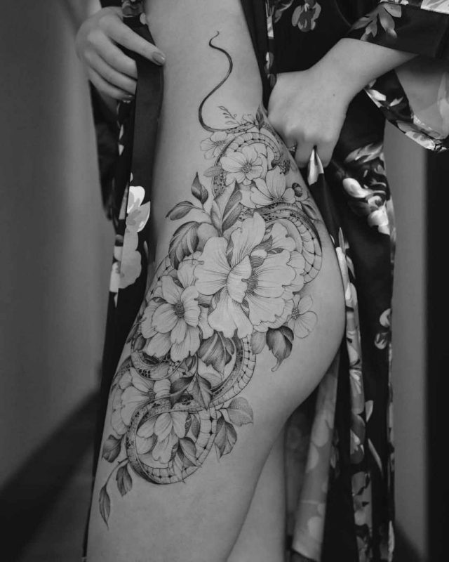 Hip Flowers Tattoo by Tritoan Ly