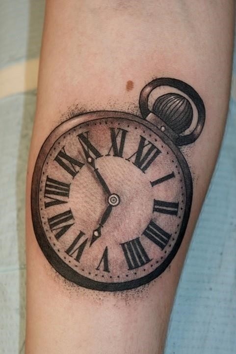 Tattoo of a skull in a Roman clock and in front of a pocket watch in