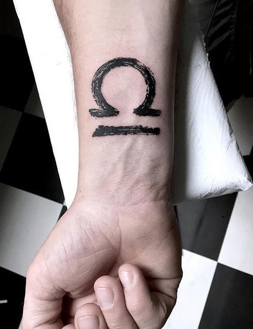 Libra Tattoo On The Wrist