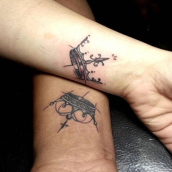 Matching Crown Tattoos on Hand