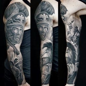 Roman Greek soldier portrait black grey realistic full sleeve tattoo 300×300