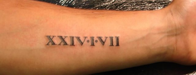 Roman Numeral Tattoo On Forearm