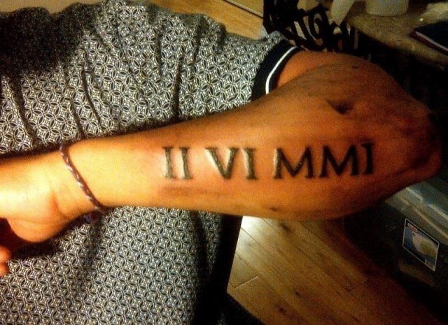 Roman Numeral Tattoos On Men Arm