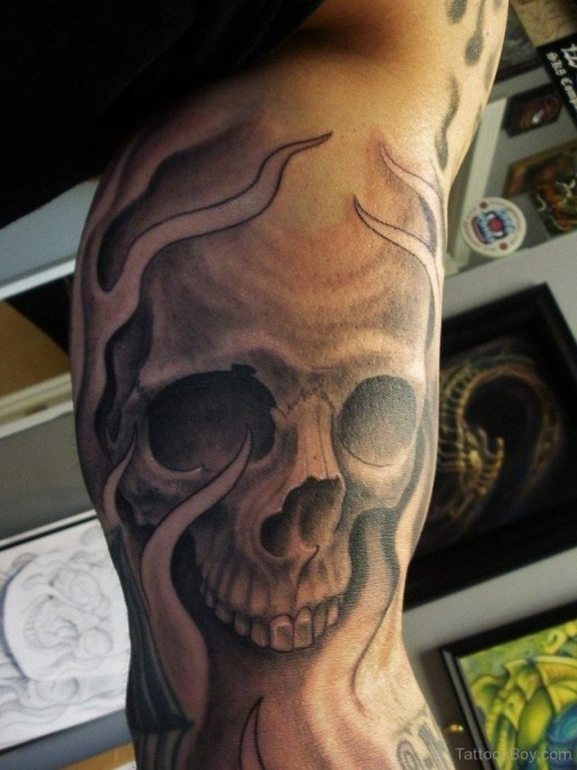 Skull And Flame Tattoo On Bicep TB1091