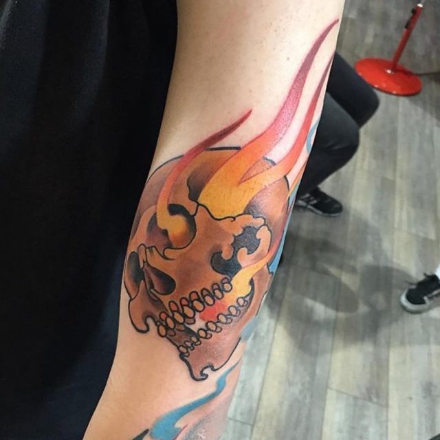 Skull on Fire Tattoo by Dawid Gaura
