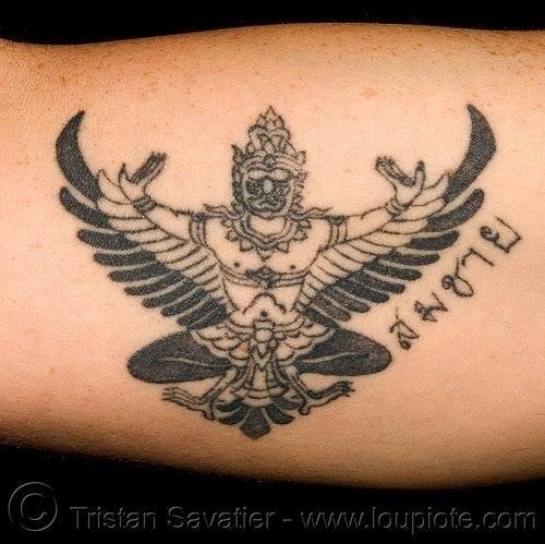 Thai God With Garuda Tattoo On Arm