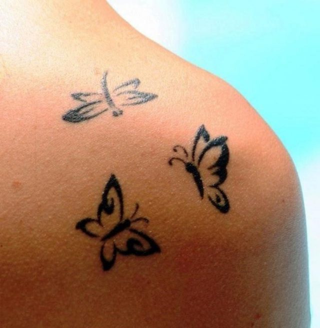 Three Cute Black Butterflies Tattoo On Shoulder