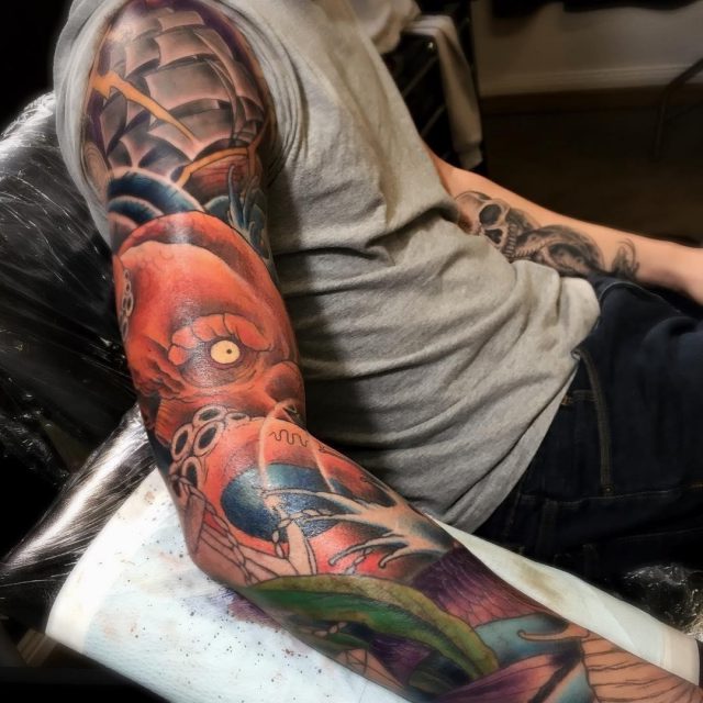 Traditional Pirate Ship With Octopus Tattoo On Man Right Full Sleeve