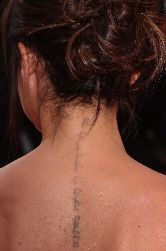 Victoria Beckham Hebrew neck tattoo