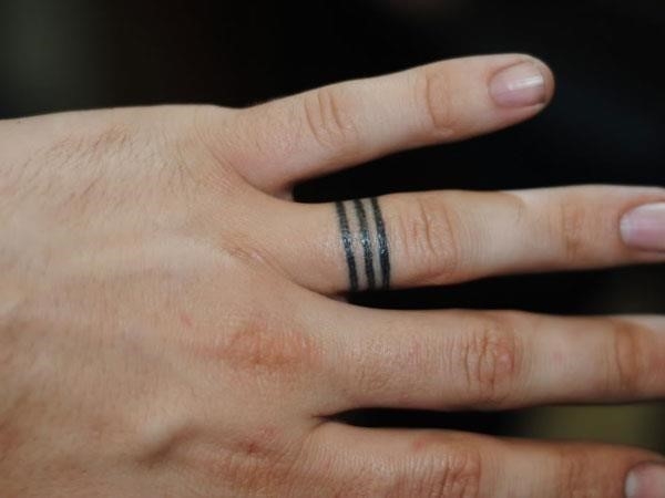 Wedding Ring Tattoo Design On Finger