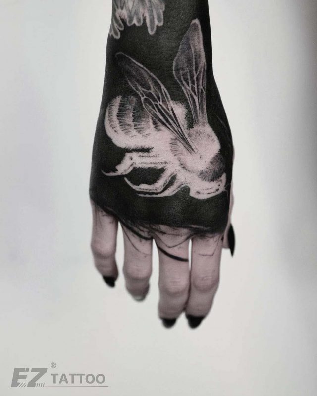 White Bee Tattoo on Hand by Timur Lysenko