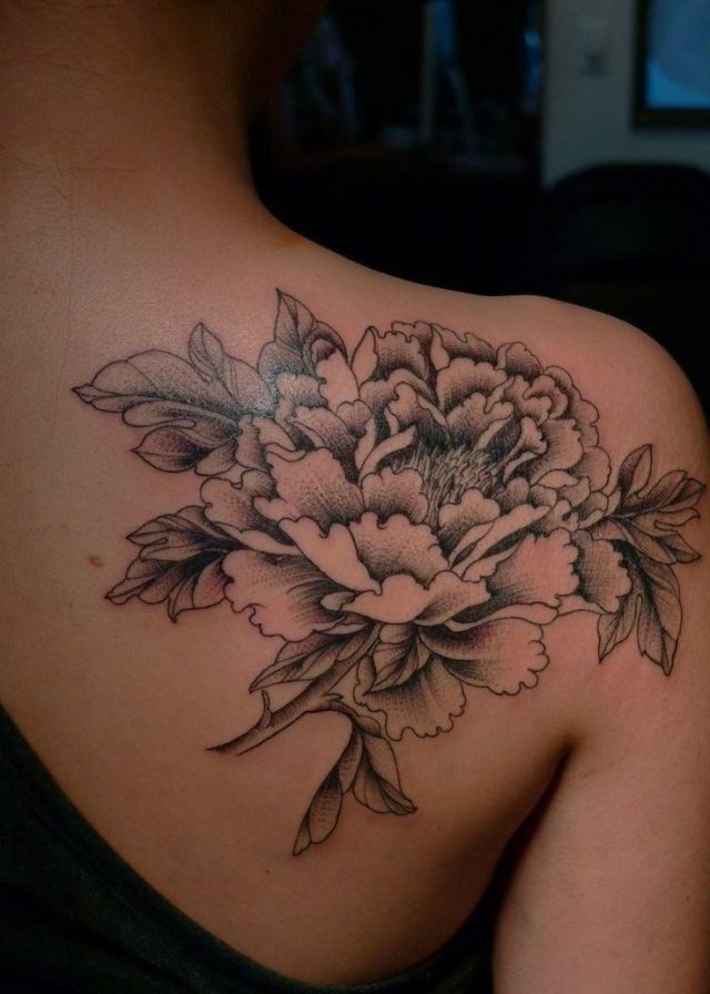 White and black flower tattoo