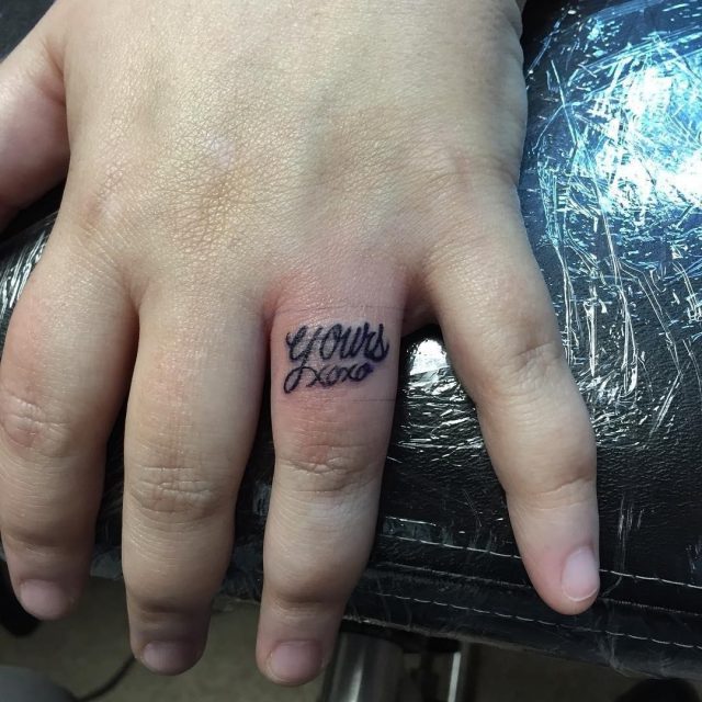 Word Tattoo on Finger