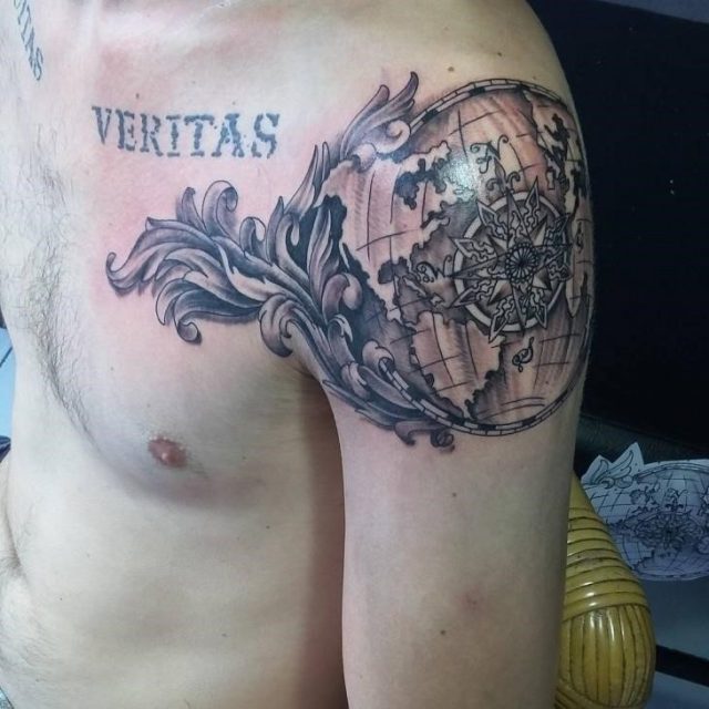 World Map Shoulder Tattoo