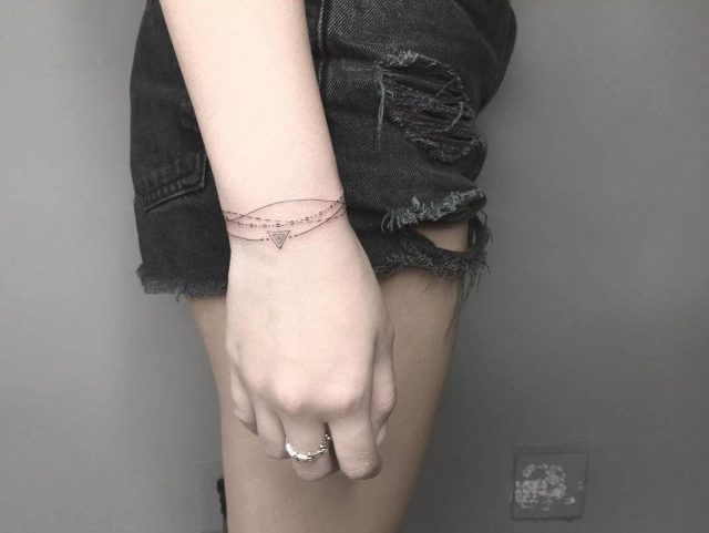 Wrist Bracelet Tattoo by Auuuyo e1472149328267