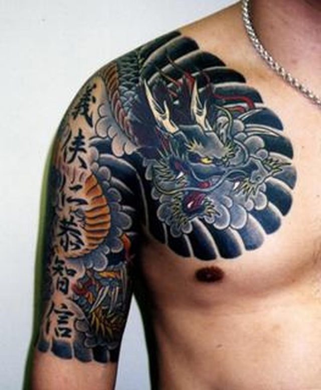 Attractive asian tattoo on chest arm