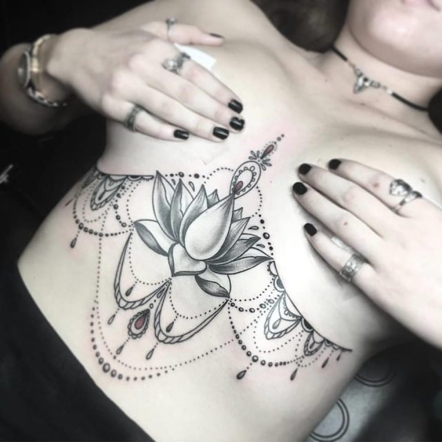 Attractive classic sternum tattoo design