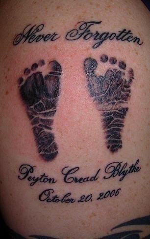 Baby feet tattoo