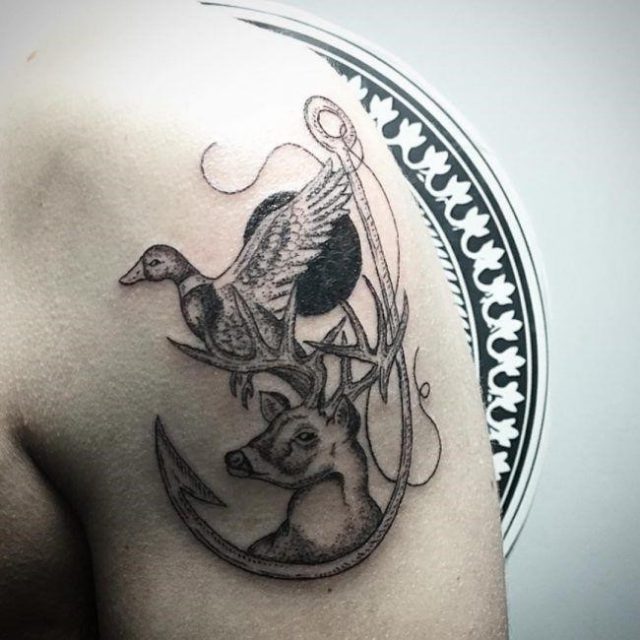 Bird hunting tattoo with deer